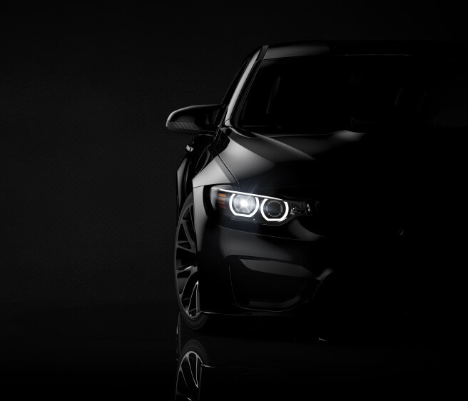 Front view of a brandless modern car on a black background